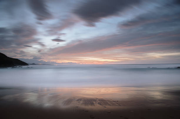 istock Long exposure of a beach at sunset 1288307369
