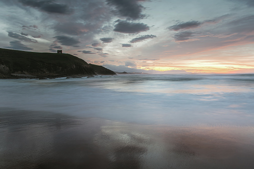 A beautiful beach at sunset in Cantabria, Spain. Tagle, Suances, Cantabria, Spain.