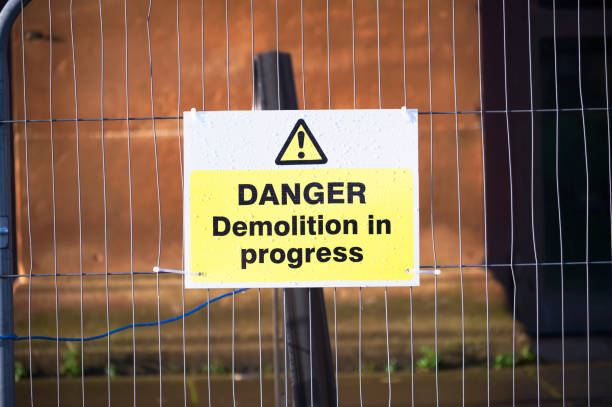 istock Demolition in progress keep out sign at construction building site 1288308646