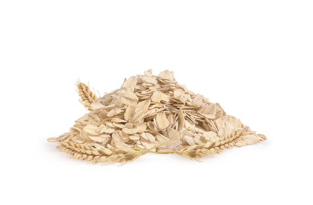 istock oat flakes and oat ears on a white background 1288308649