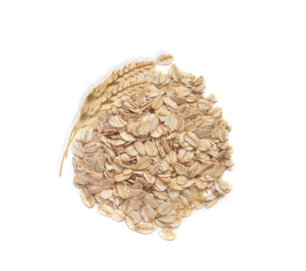 istock oat flakes and oat ears on a white background 1288308652