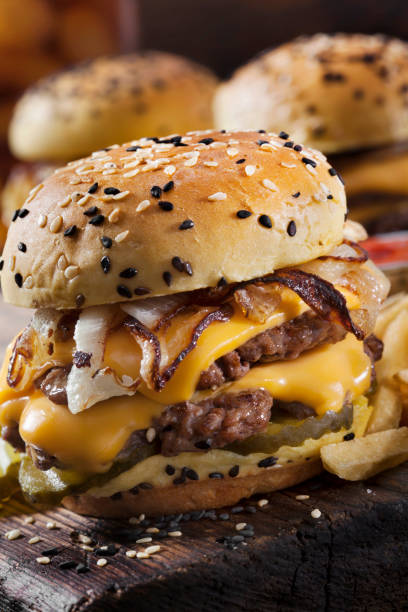 Double Cheese Burger Sliders with Fried Onions, Pickles on a Brioche Sesame Seed Bun
