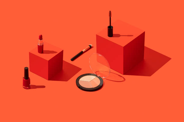 istock Makeup, cosmetics on red geometric background with red cubes 1288322605