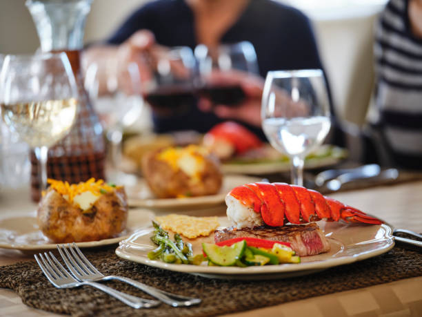 luxury dining - steak dinner lobster wine imagens e fotografias de stock