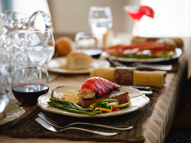 luxury dining - steak dinner lobster wine imagens e fotografias de stock