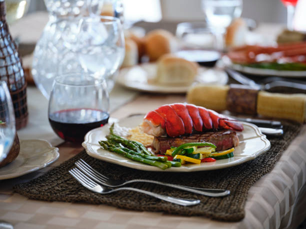 luxury dining - steak dinner lobster wine imagens e fotografias de stock