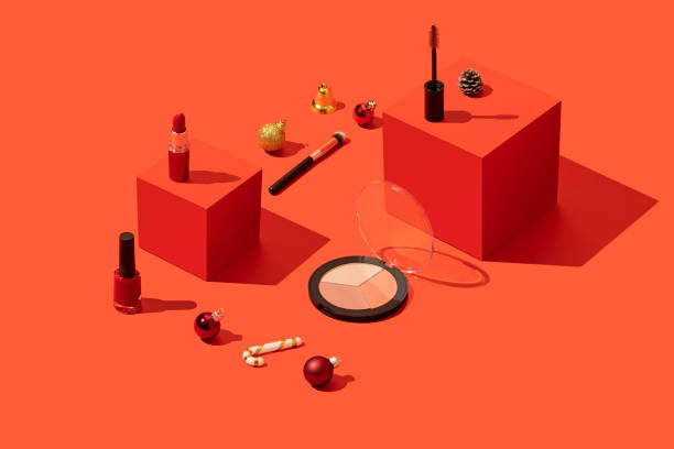 istock Makeup, cosmetics on red Christmas background with red cubes 1288325160