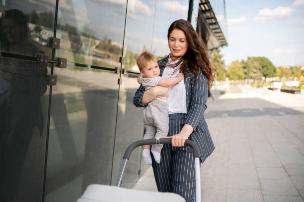 istock Mom and a baby going on a walk during the nice day 1288331996