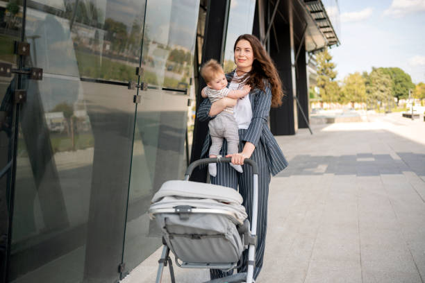istock Confident mother and her baby having a walk 1288331998