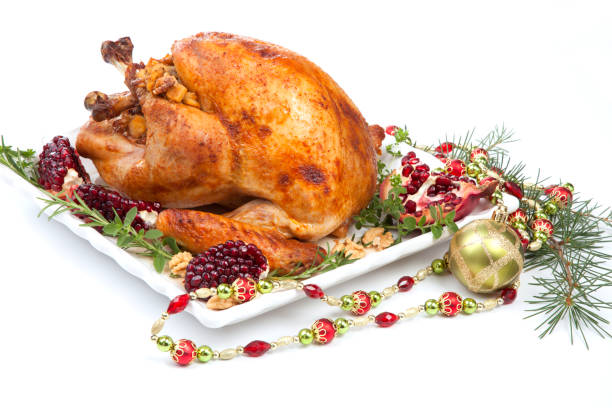 istock Pomegranate Glazed Roasted Turkey on White 1288341171