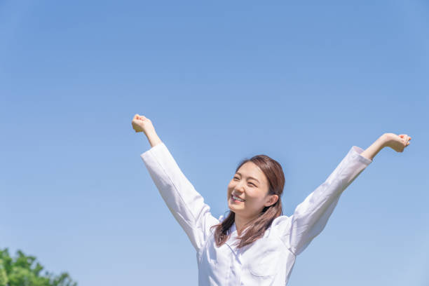 istock asian woman in a white coat 1288342656