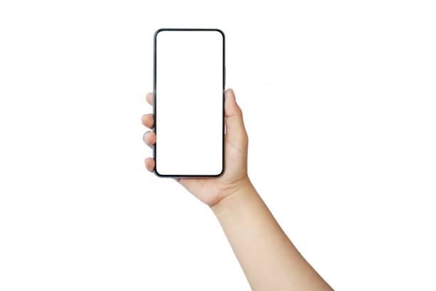 istock Hand holding a blank screen smartphone isolated on white background with the clipping path. 1288346415