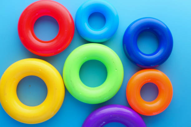 istock Baby toys on color background. Child development concept. 1288347482