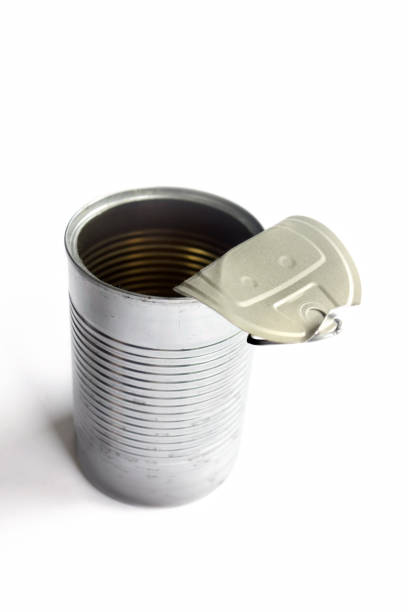 istock Close up opened shiny metal can over white 1288355299