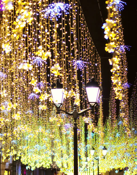 istock Lights on the New Year tree and New Years lights on a dark background 1288367422