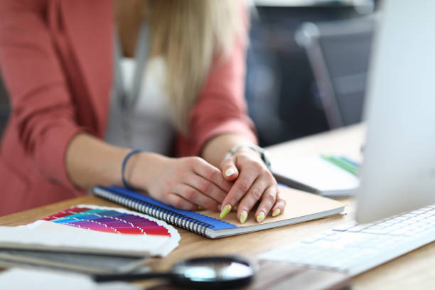 istock Business woman in office sits at table 1288368368