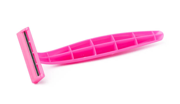 istock Female pink razor shaver isolated on white background 1288369024
