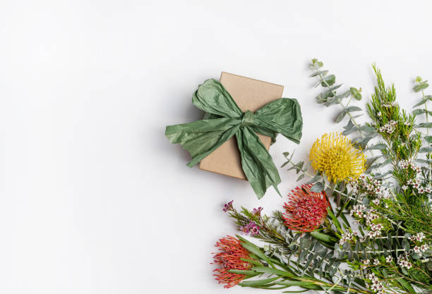 istock Elegant gift surrounded by beautiful Australian native flowers. 1288369953