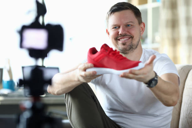istock Happy guy present stylish shoes 1288369979