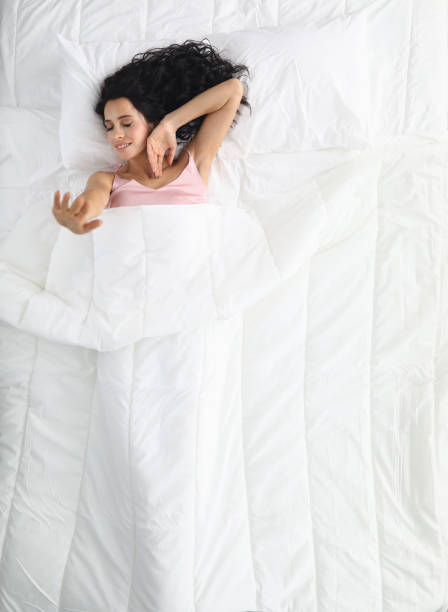 istock Happy and joyful person in bed 1288370768