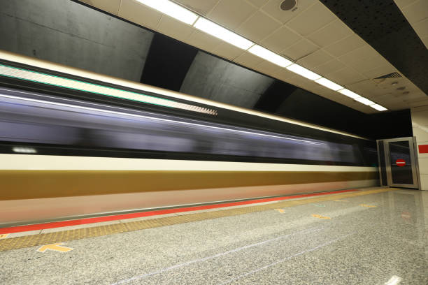 istock Motion Blured Metro Moving in a Station 1288376442