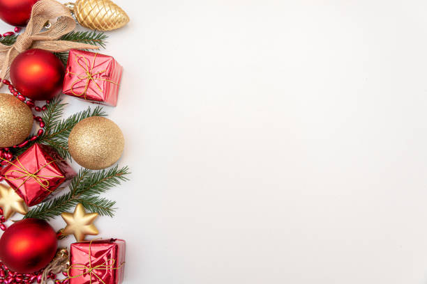 istock christmas gift with gold and red balls bow isolated on white background 1288376851
