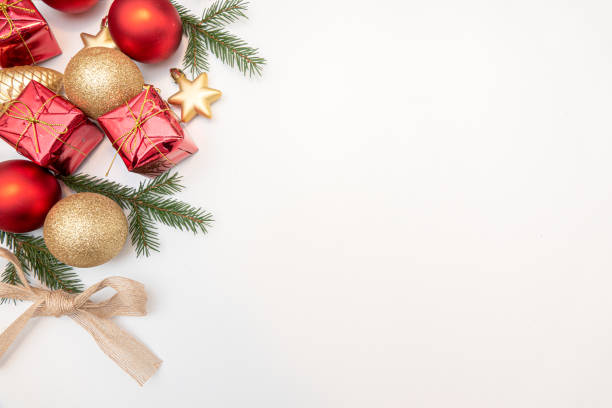 istock christmas gift with gold and red balls bow isolated on white background 1288377520