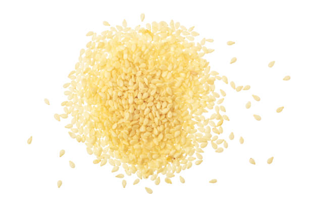 istock Sesame seeds isolated on white background top view. Flat lay 1288385560
