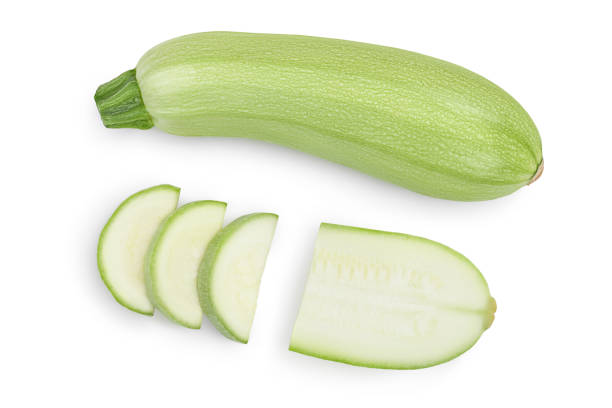 istock zucchini or marrow isolated on white background with clipping path. Top view. Flat lay 1288386472