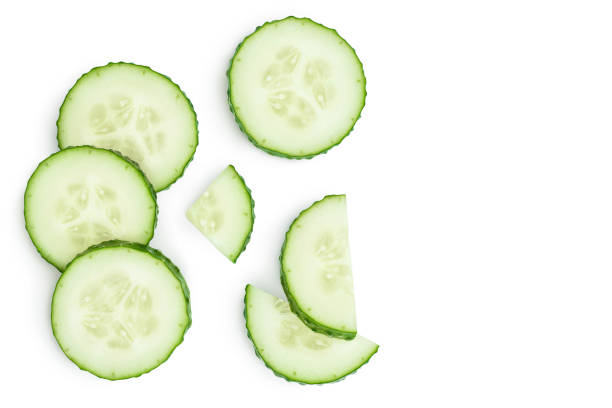 istock Sliced cucumber isolated on white background with clipping path, Top view with copy space for your text. Flat lay 1288386480