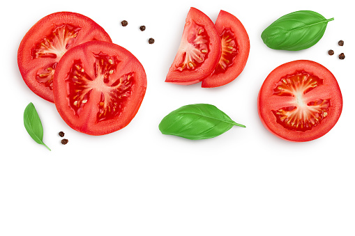 Tomato slices with basil and peppercorns isolated on white background. Clipping path. Top view with copy space for your text. Flat lay