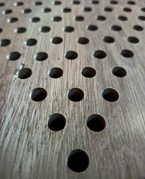 istock Holes on the wood surface 1288389038