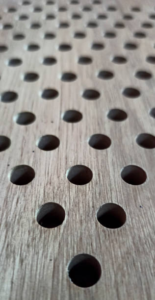 istock Holes on the wood surface 1288389115