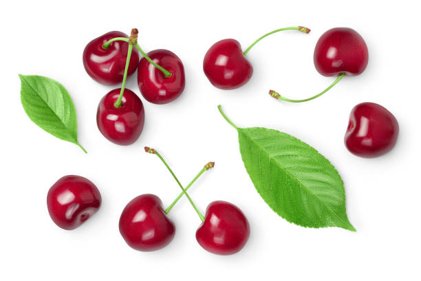 istock red sweet cherry isolated on white background with clipping path . Top view. Flat lay 1288389303