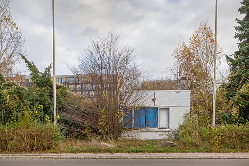 Frederikssund, Zealand, Denmark, November 19, 2020.  Abandoned office building in a small town