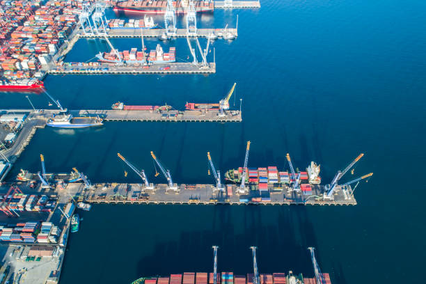 istock Container ship loading and unloading in deep sea port, Aerial view business commercial trading logistic import and export freight transportation, Container loading cargo freight ship maritime 1288393042