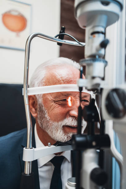 istock Senior man at ophthalmology treatment 1288393256
