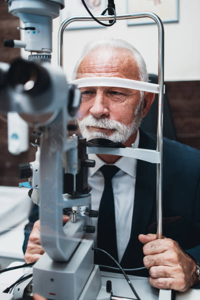 istock Senior man at ophthalmology treatment 1288393274