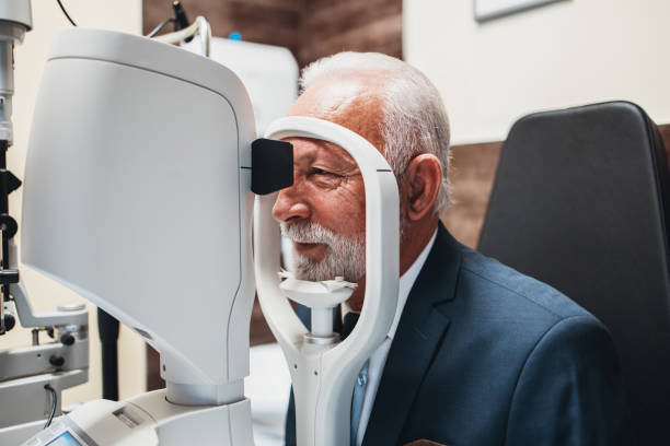 istock Senior man at ophthalmology treatment 1288393311