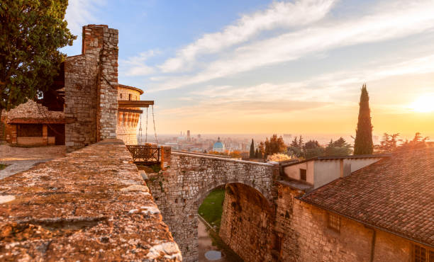 Stunning sunset over Brescia city view from the old castle. Lombardy, Italy Brescia, Italy - October 28, 2020: Stunning sunset over Brescia city view from the old castle. Lombardy, Italy brescia stock pictures, royalty-free photos & images