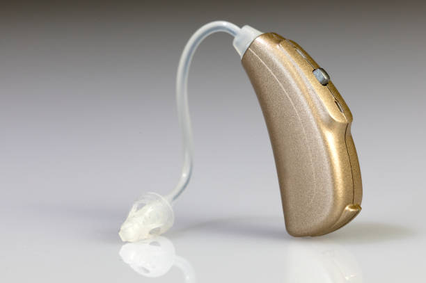 hearing_aid - hearing aid isolated technology healthcare and medicine - fotografias e filmes do acervo