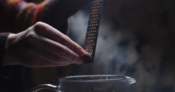 Preparing masala chai. Close-up front view