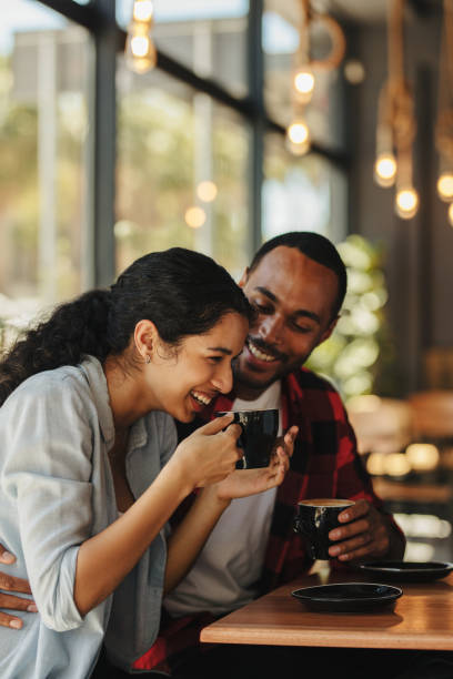 istock Couple having a great time at coffee shop 1288395922