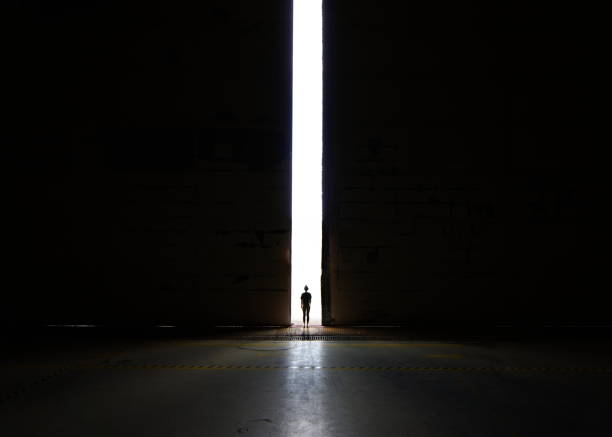 istock gate of hope and light, exit out of the darkness 1288395980
