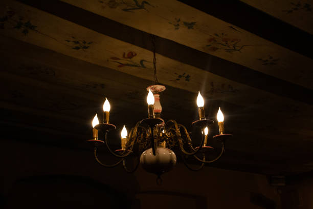 Antique light in an old decorated room.