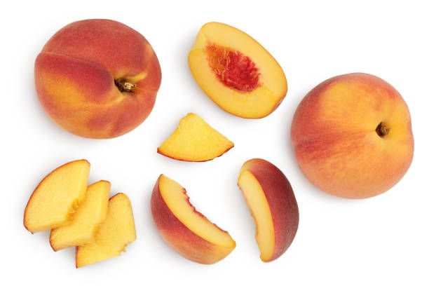 istock ripe peach isolated on white background with clipping path. Top view. Flat lay pattern 1288399303