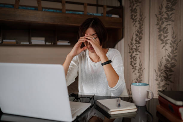 istock Upset asian woman working from home office. 1288399879