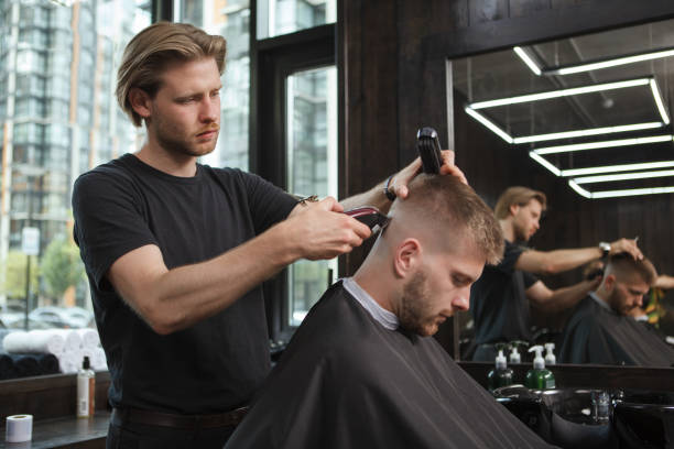 istock Handsome bearded man at barbershop 1288405839