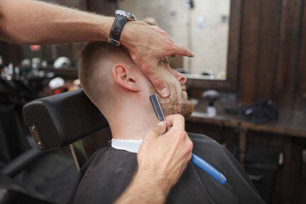 istock Handsome bearded man at barbershop 1288406912