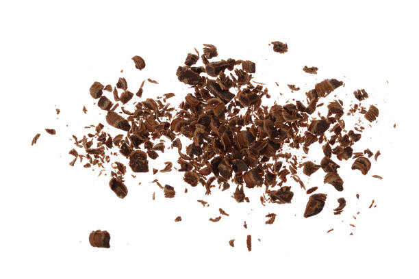 istock grated chocolate isolated on white background. Top view 1288407134